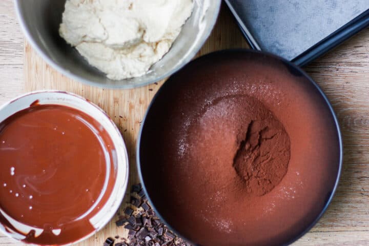 Bowls of brownie components to be combined to make the batter.