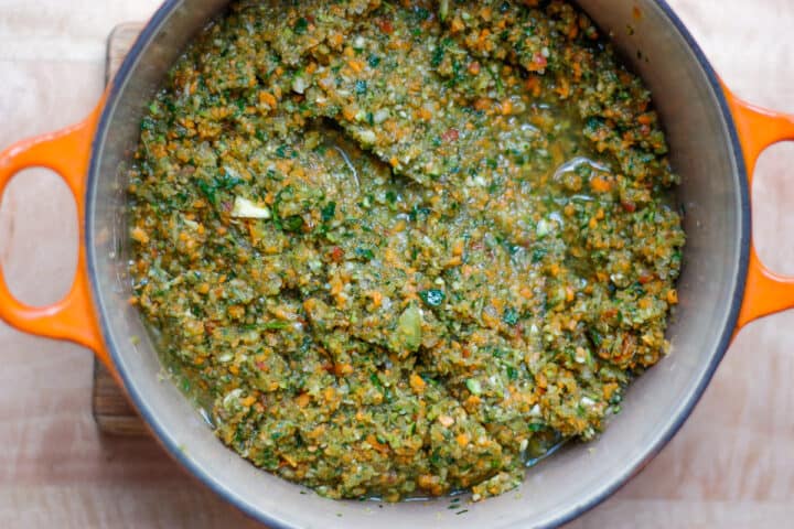 Bird's eye view of blended vegetable paste ingredients in a pan.